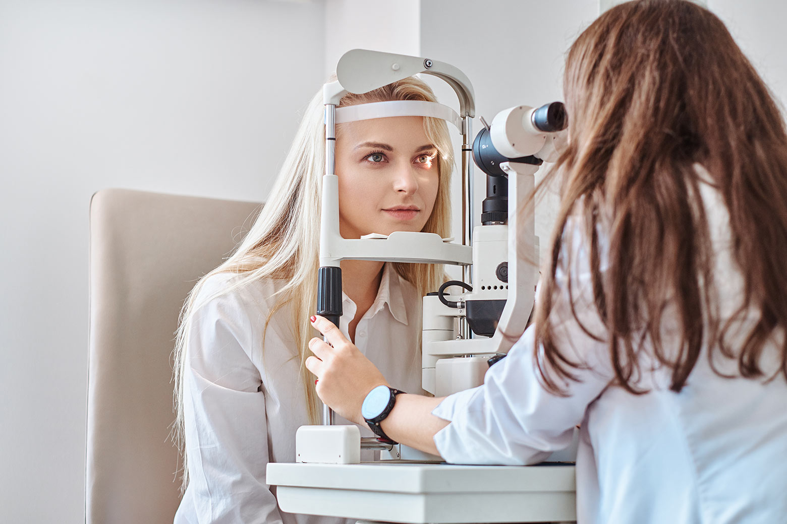 woman getting eyes checked